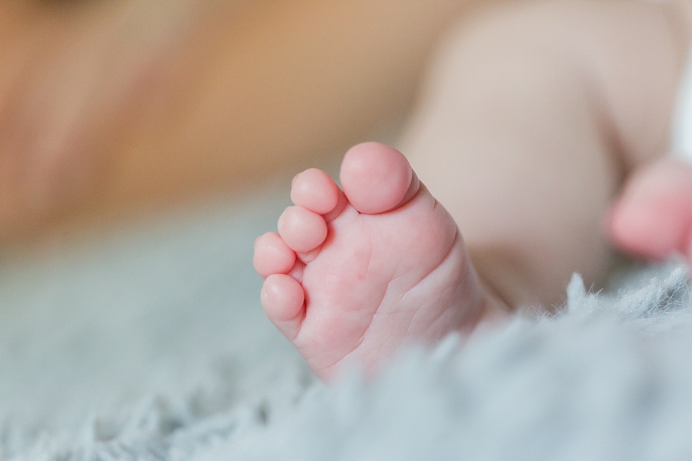 Lifestyle newborn session in clients home in Raleigh, NC by Traci Huffman Photography