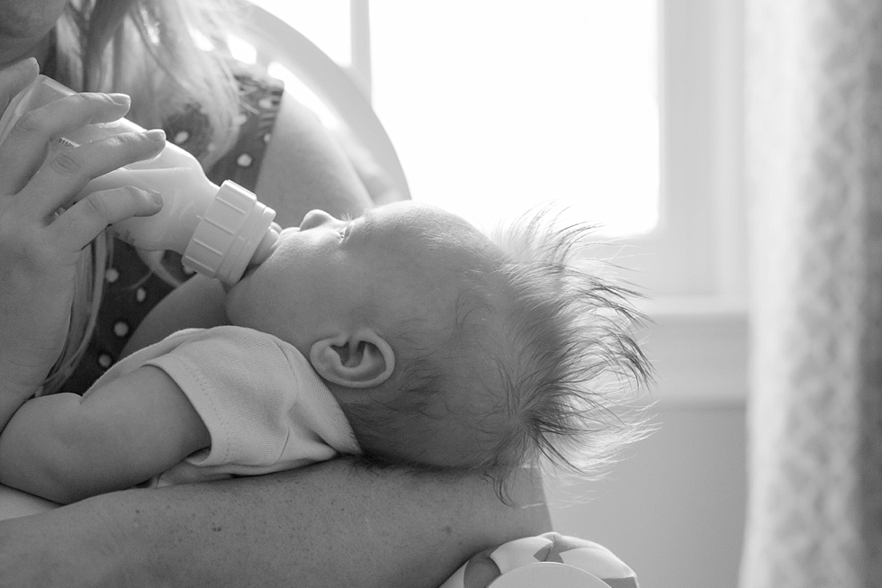 Lifestyle newborn session in clients home in Raleigh, NC by Traci Huffman Photography