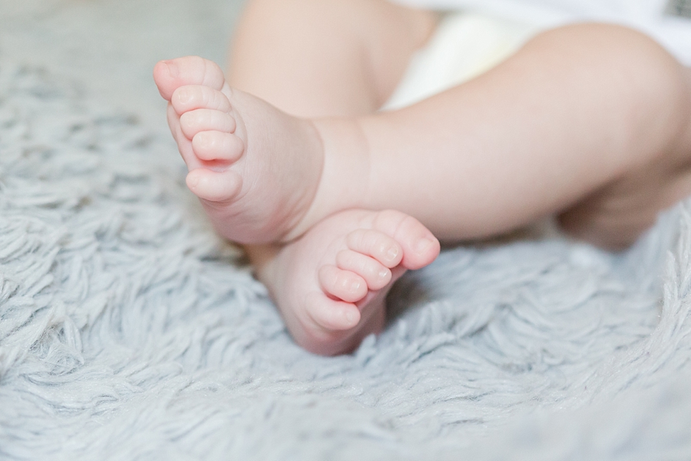 Lifestyle newborn session in clients home in Raleigh, NC by Traci Huffman Photography