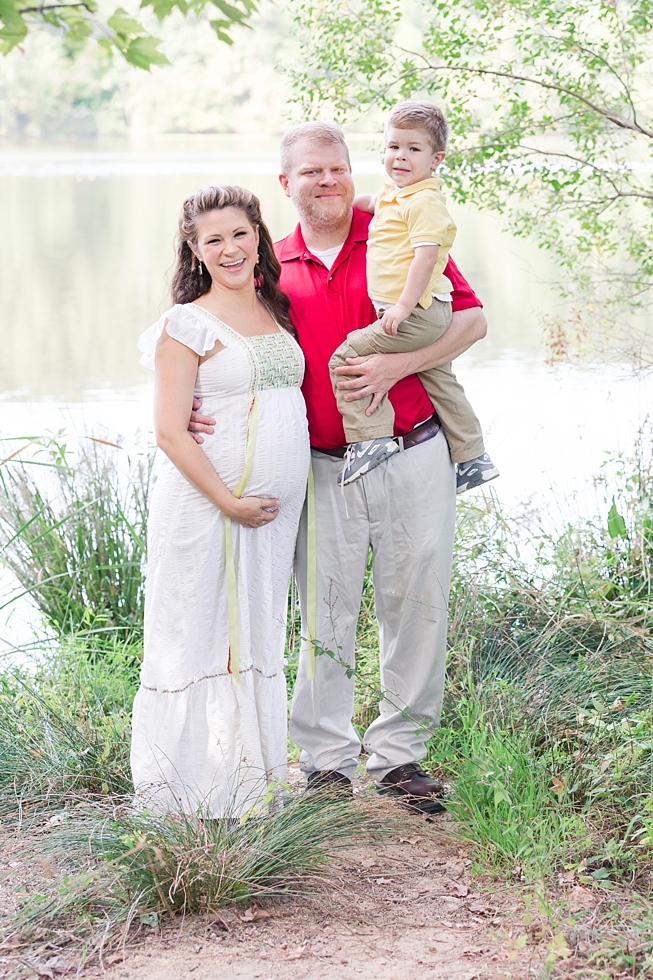 Raleigh, NC maternity photos taken by Traci Huffman Photography at Yates Mill in moms wedding dress