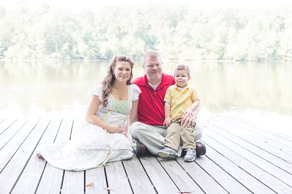 Raleigh, NC maternity photos taken by Traci Huffman Photography at Yates Mill in moms wedding dress