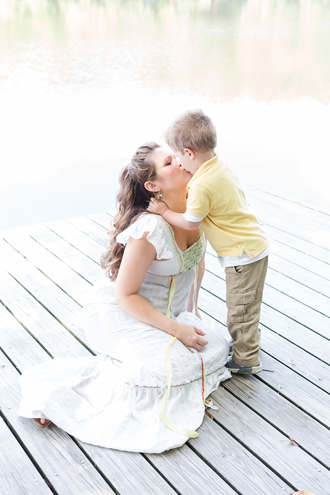 Raleigh, NC maternity photos taken by Traci Huffman Photography at Yates Mill in moms wedding dress