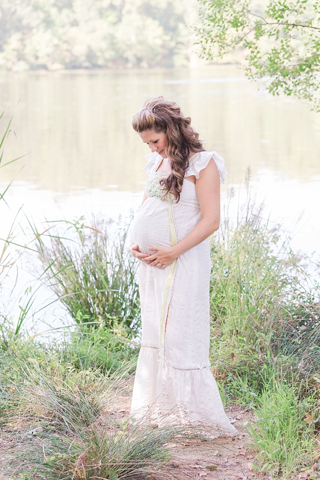 Raleigh, NC maternity photos taken by Traci Huffman Photography at Yates Mill in moms wedding dress