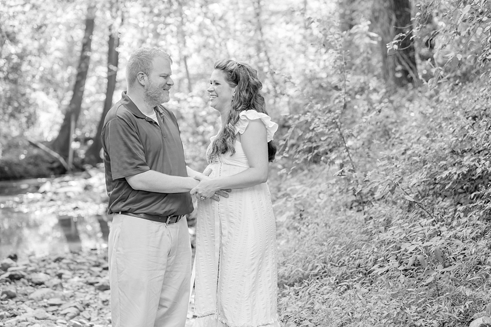 Raleigh, NC maternity photos taken by Traci Huffman Photography at Yates Mill in moms wedding dress