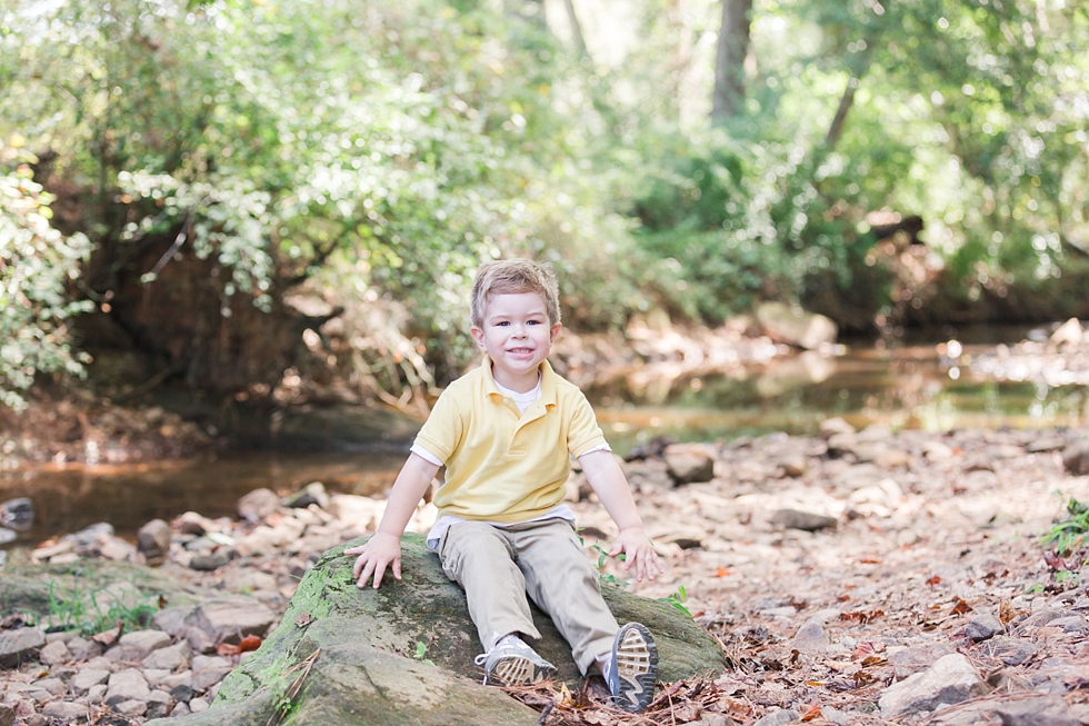 Raleigh, NC maternity photos taken by Traci Huffman Photography at Yates Mill in moms wedding dress